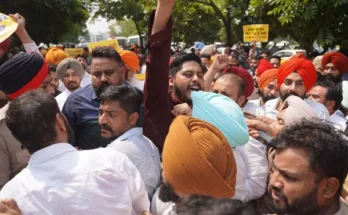 AAP leaders and workers protest against ED raids before elections
