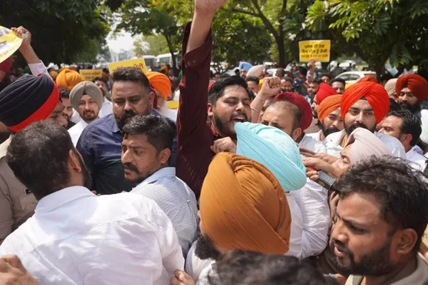 AAP leaders and workers protest against ED raids before elections