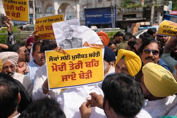AAP protests in Jalandhar and Pathankot against additional charges on UPI