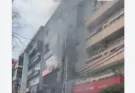 A sudden fire broke out in a three-storey building and its adjoining buildings in the Model Town area of northwest Delhi on Friday.