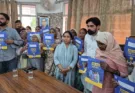 Cabinet Minister distributes documents regarding ownership rights to people living within the red line of 3 villages