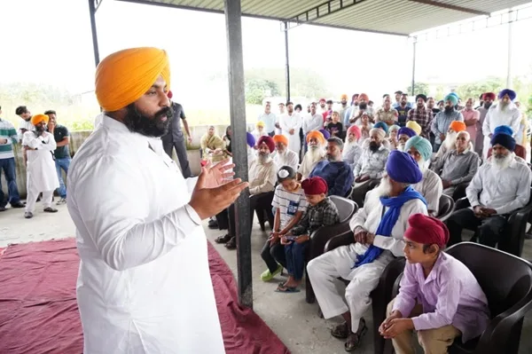 Cabinet Minister Harjot Singh Bains listened to the problems of the people during a public meeting in village Khanpur.
