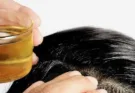 Don't make these mistakes while applying oil to your hair.
